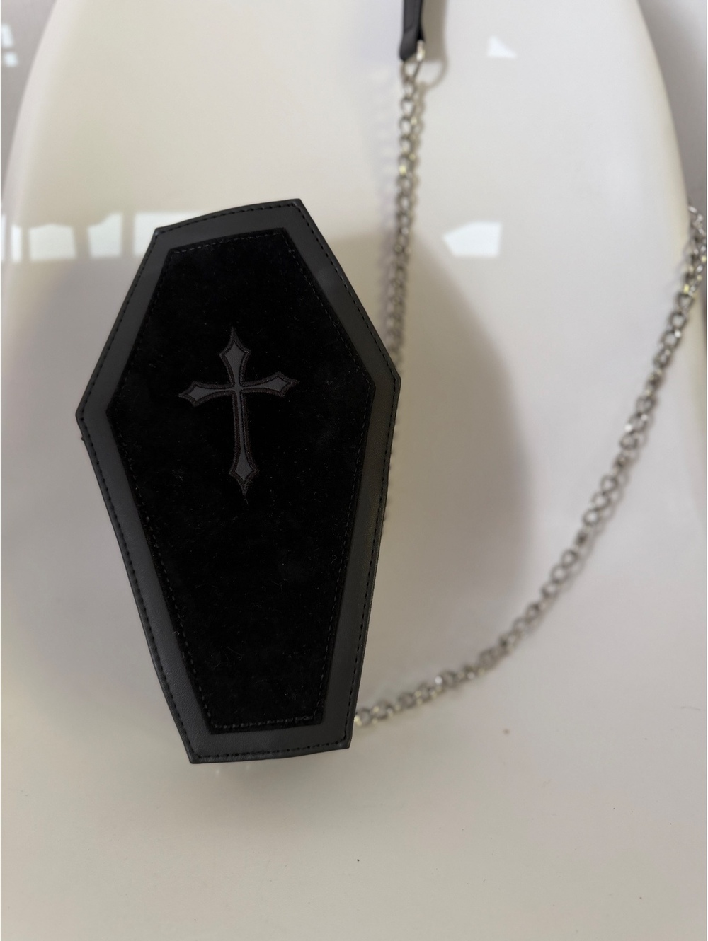 Black coffin crossbody bag with chain strap